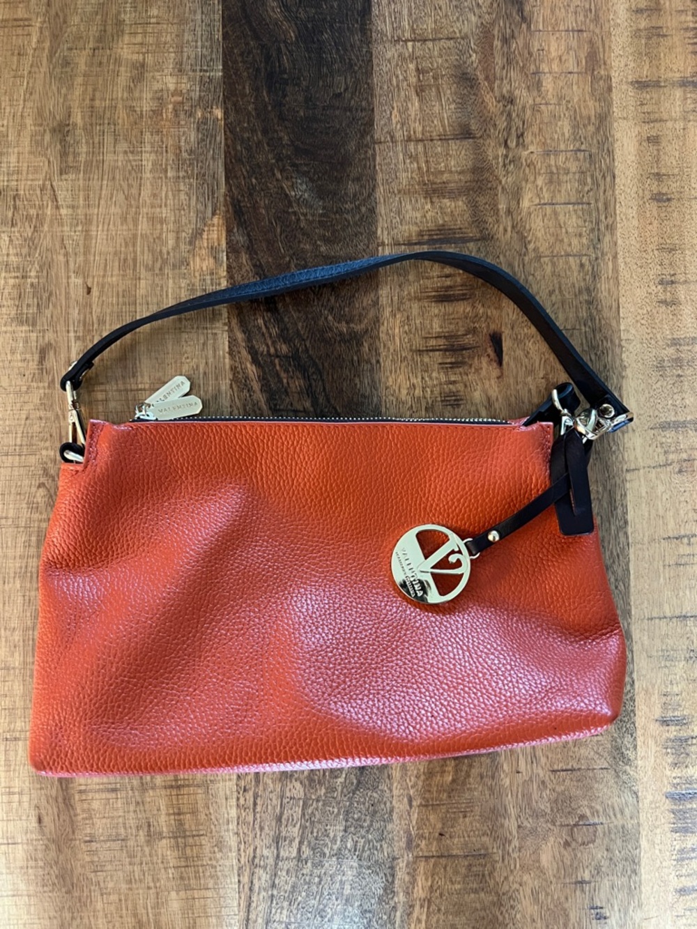 Pebble Leather Shoulder Bag in Burnt Orange with Gold Charm